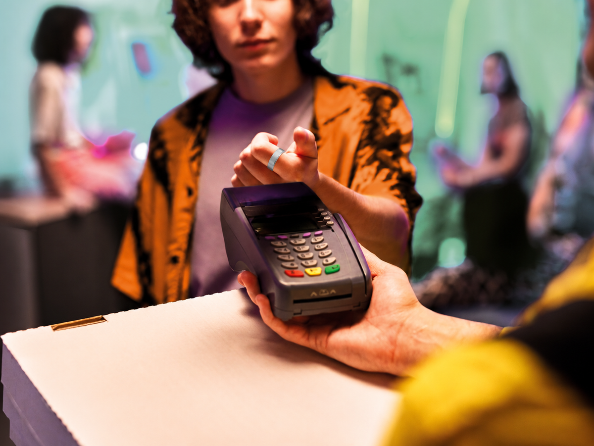 RingPay Limited Edition Steel Payment Ring being tapped on a contactless card reader